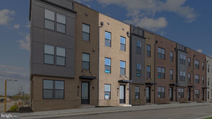 **OFFERING UP TO $12,500 IN CLOSING ASSISTANCE WITH USE OF PREFERRED LENDER AND TITLE** **OFFERING $10,000 FLEX CASH QUICK MOVE IN**
Welcome to the Bridgton, an open-concept luxury townhome with modern finishes and an urban aesthetic! Enter the home through the main entryway or the rear load garage, leading into a spacious foyer with study and full bathroom. Ascending to the second level, you will discover the main living space comprised of a sunlit family room, a generously sized chef kitchen, and a dining room complete with a sliding glass door and rear deck access. With an oversized island. When it's time to relax, retreat to the primary suite, a private getaway that can be found on the third level of the townhome. Primary suite includes 2 closets, ensuite bath with roman shower with dual shower heads. The laundry room is also located on the third level, conveniently accessible from the primary suite and secondary bedroom. Enjoy stunning views from the fourth level's loft deck, a private outdoor living area perfect for entertaining family, friends, and loved ones. The fourth level offers an second primary suite with open entertaining, recreation, and wet bar. ***THIS PROPERTY MAY QUALIFY FOR THE BROWNFIELD TAX CREDIT. WHICH COULD RESULT IN UP TO A 70% REDUCTION IN ANNUAL CITY PROPERTY TAXES. SEE SALES CONSULTANT FOR MORE INFORMATION*** *Photos may not be of actual home. Photos may be of similar home/floorplan if home is under construction or if this is a base price listing.