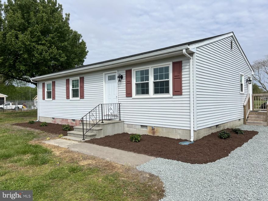 The ideal starter home situated on a rural lot, Mardela/Hebron schools, with plenty of room to expand. Many upgrades in 2022 including: replacement windows, roof, drywall, subfloor, flooring, fixtures, bathrooms, paint, kitchen, cabinetry, appliances, and decks. A more recently added concrete patio allows you to take in the expansive back yard and surrounding country views. Details you can appreciate include the upgraded drainage culverts and large landscape rock ensuring your oversized stone driveway withstands the test of time, a new shed in 2024, and an easy open spa cover for ease of accessibility while you enjoy your new hot tub. Many financing options, call your lender today!