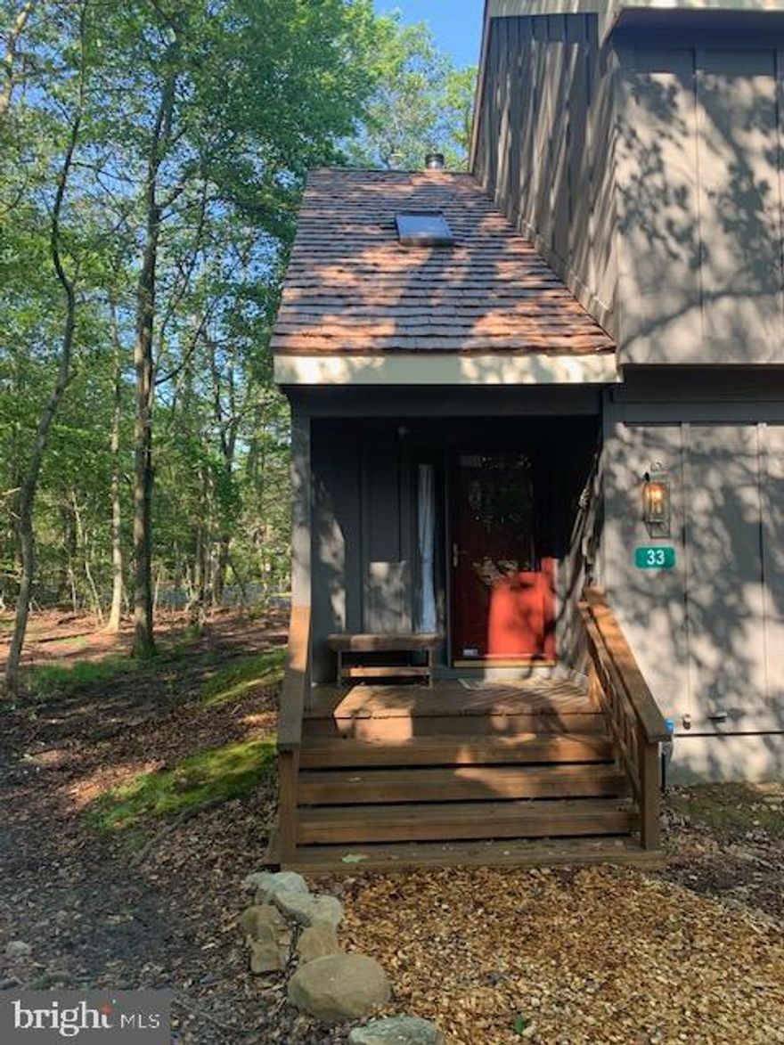 INVESTOR ALERT!  NEW ROOF AND INSULATION COUPLED WITH A GREAT PRICE AND A MOTIVATED SELLER ALONG WITH CONCESSIONS FOR REPAIRS WHICH WERE NOT ABLE TO BE COMPLETED DURING "OFF SEASON"! Many upgrades were done during sellers ownership including a new cedar shake roof, (January 2025), along with 18" of new R60 TruSoft Cellulose insulation in the attic, replaced various lighting fixtures, new TV's (50" in LR, 30" in Primary), some new ceiling fans, new interior paint in some rooms, new curtains throughout, new bedding covers, 2 year old carpeting, and the crawl space entry door has been replaced with  a new safety door.   This Pocono home is within walking distance to Jack Frost Ski slopes and Golf Course.  Membership in the community allows you to purchase  tickets to enjoy Big Boulder Ski Resort and Pools (3 miles ) for year-round fun in the Poconos. Seller has had a successful rental history over the last 2 years. The property is currently monitored remotely by cameras (not included in the sale) and a secure door system which conveys with the property.  If you're considering purchasing a townhome close to ski resorts and all the fun the Poconos has to offer, this is your opportunity to take advantage of the situation for this mountain retreat and get-a-way within 90 minutes of Montgomery, Chester, Berks, Bucks and Delaware Counties.  You won't want to miss this recently redecorated and re-roofed home which make it the best product for sale in Snow Ridge Village.  Call today for an appointment. Tours can begin 3/2/2026.  SELLER CONCESSIONS include $2160, which is the amount quoted for exterior repairs by a reputable company from that area.   RENTALS ARE PERMITTED AT THIS PROPERTY AND PETS ARE PERMITTED IF OWNED BY PROPERTY OWNER.  Tax data has not been updated by the County.  LISTING AGENT IS RELATED TO SELLER