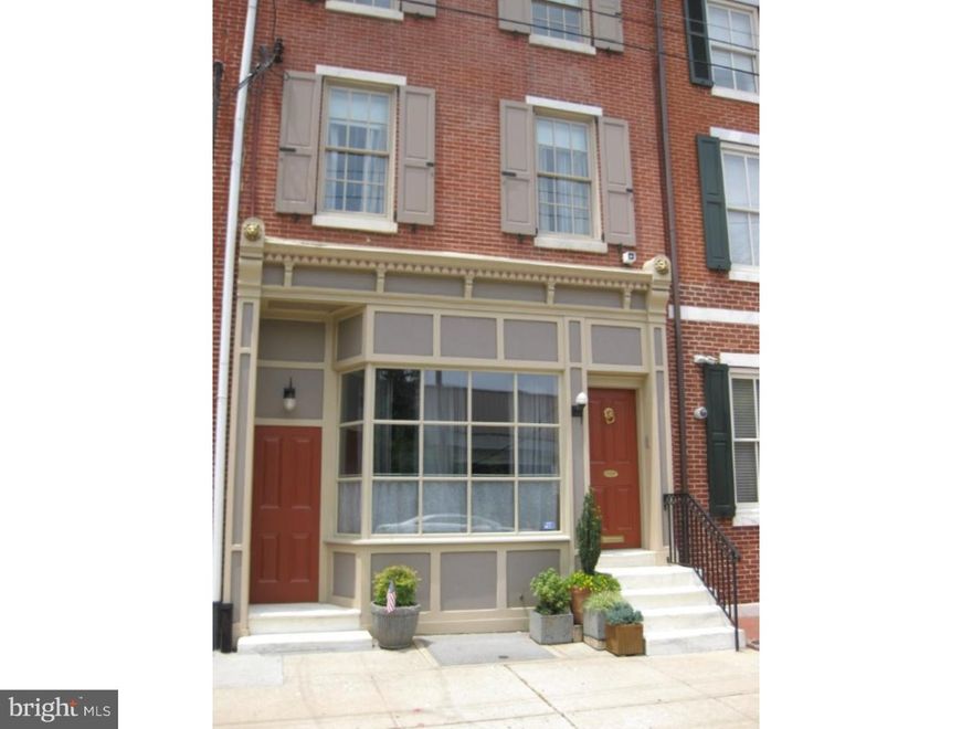 THIS HOME WAS FEATURED in the NEW YORK TIMES - December 21, 2016.  To read article by Michael Powell and view the slideshow, just google "What You Get - New York Times." Stunning artist's home, 3300 sq ft, running street to street with garage and fabulous indoor garden.  Sun-lit slate entrance features beautiful garden-art installation, leading to sunken living area with exposed brick, high ceilings, gas fireplace, and original wood floors.   Up to beautifully  trimmed dining room with skylight and west-facing window, charming powder room off hallway.  Kitchen great-room is a country-style gem with Italian tile, antique cabinets, spacious island, and Viking /Bosch appliances.  Bright eating nook and sitting area open to the enchanting indoor garden art installation, with fountain, gorgeous greenery, and numerous temperature and light-control features.  Garage with potting bench and ample storage.  Second floor rear features spacious bedroom/office, a lovely laundry room, and gorgeous new full bath.  Master suite 2nd fl front has its own sitting room and beautiful en suite. Third floor offers 2 bedrooms, 4 large hall closets, and huge full bath.  On the fourth floor is the spacious, sunny art studio, with skylights, vaulted ceilings, and cozy Franklin stove.  Basement houses mechanicals, irrigation, water filters, and generous work space with SS sink, cabinets, and storage. Meredith Catchment.