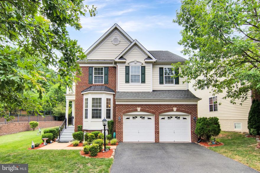 Welcome to 16253 Radburn St, located in the lovely community of Port Potomac in Prince William County. This Spacious home offers 4 Bedrooms, 4.5 Baths with a BONUS ROOM in the basement. This home feels like a true 5-bedroom home, with a total SQFT of 4,171 SQFT.  With the builder this home was a premium lot and offered a nice open area to the side of the home and one neighbor to the other side.  A MUST SEE!!  Sellers did not hold back on this home on options and finishes.  The home feels like a model home and SUPER clean. Fully finished 3 level home with Hardwood floors on the middle level, open feel concept on the middle floor, large open kitchen with luxurious granite countertops, up graded back splash, cook top, double oven, 2 dining room areas, 2 living areas on the main level, 4 Bedrooms upstairs with an oversize master bedroom, oversize bathroom with an oversize walk in closet. 4th bedroom upstairs offers a full bathroom, laundry room on 3rd level, fully finished basement with open area, theater room, full bath, along with the bonus room. If you and the family enjoy the outdoors this home has an over side deck with steps leading to the yard. This home has one home to one side and an open area to the other side with a beautiful retaining wall… feels private when your there. This home has a 2-car garage plus a wide driveway with ample parking space and street parking in front.  Conveniently located just moments from Stonebridge Shopping center, Potomac Mills Mall, movie theaters, restaurants, schools, shopping, parks, boat storage, boat launch area, trails, near VRE, i-95, commuter lot, and neighborhood amenities… including pool, playgrounds, gym, and tennis courts!! Don’t miss this great opportunity. See it today!!