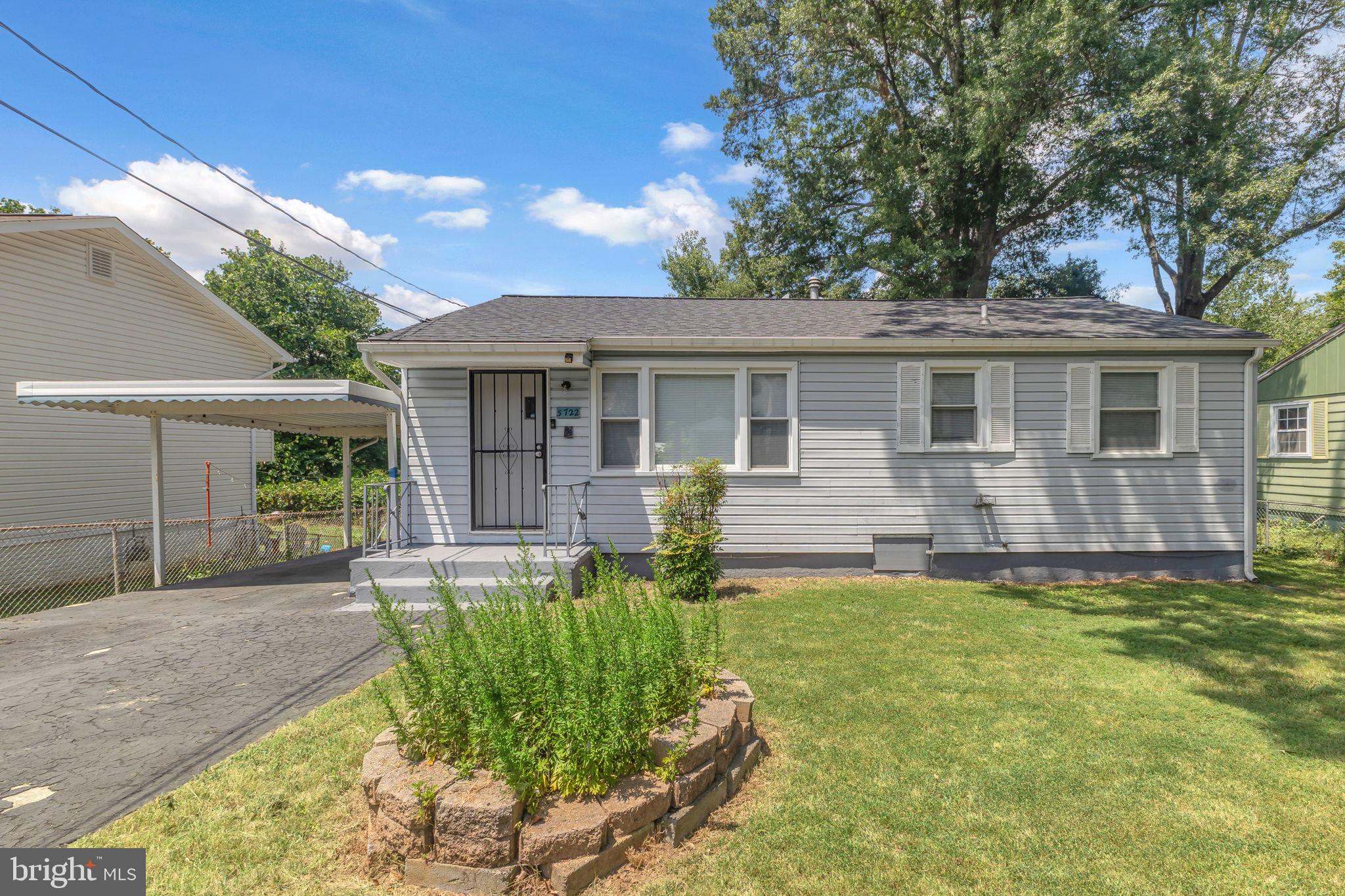 Great home in a great location! This charming rambler offers a spacious living room and kitchen, three generously sized bedrooms, a carport for covered parking, a fully fenced yard, and a storage shed out back! The home has been lovingly maintained and features many updates as well, including vinyl windows, a new roof in 2019, fresh paint and new laminate plank flooring, and the HVAC system and stove were even recently serviced! There's plenty to love about this home and there's plenty of room to update according to the new owner's taste! Easy access to DC and everything the area has to offer! This home is being sold in as-is condition.