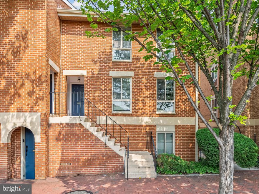 Welcome to this spacious top-level 2-bedroom, 2-bath condo—the largest floor plan in the community—offering both comfort and a prime location in the heart of Baltimore. Recently updated, the unit features a refreshed kitchen and bathrooms, fresh paint, new carpeting, and newer luxury vinyl plank flooring throughout.

The open-concept living and dining area includes an elevated fireplace with a built-in wood storage niche and connects seamlessly to a galley-style kitchen. The primary bedroom features an en-suite full bath, while the second bedroom is served by a full hallway bath, making the layout ideal for a variety of living arrangements.

Included with the unit is one reserved off-street parking space and gated parking area located in Otterbein. Residents also have the option to purchase two additional on-street parking passes for just $20 per year each. The condo fee covers water, sewer, and access to the community pool—an exceptional value.

Ideally situated near the border of Federal Hill and Otterbein, this condo offers walkable access to Camden Yards, M&T Bank Stadium, the Baltimore Convention Center, the National Aquarium, Maryland Science Center, and the Inner Harbor. The location is perfect for commuters, with convenient access to the MARC Train, Light Rail, I-395, and downtown Baltimore.

Whether you're a first-time buyer, investor, or simply looking to enjoy city living with modern updates and unbeatable access, this condo is a standout opportunity.