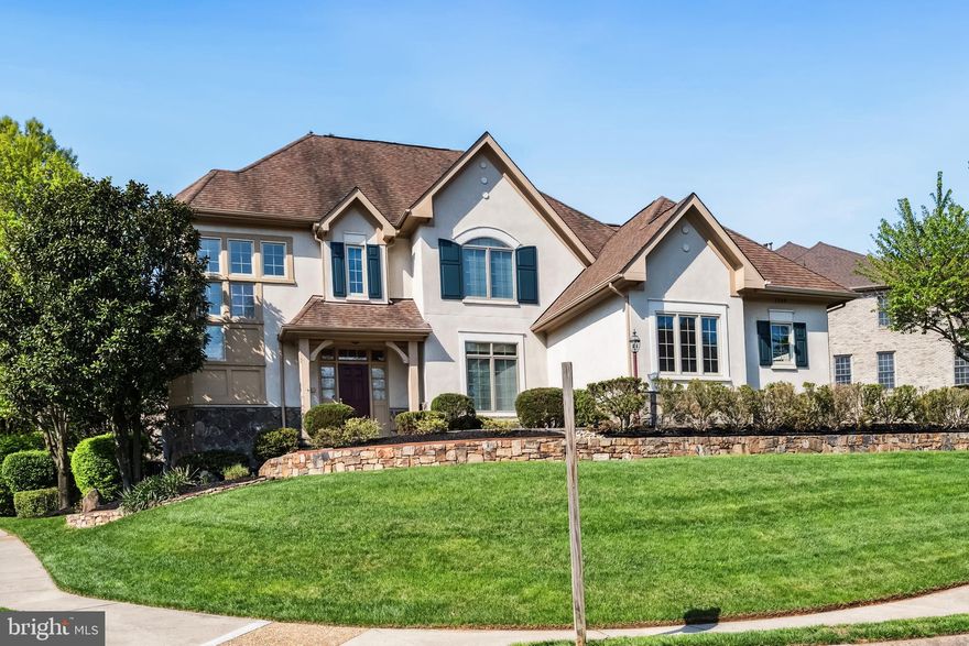 Located in the prestigious Wellington neighborhood of Vienna, VA, 1546 Wellingham Ct is a stunning 5-bedroom, 5.5-bathroom colonial-style home offering approximately 4,400 square feet of elegant living space on a 0.26-acre lot. Built in 2001, this meticulously maintained residence features a grand two-story foyer, hardwood floors, and custom moldings throughout. The gourmet kitchen boasts granite countertops, stainless steel appliances, and a large center island, which opens to a spacious family room with soaring ceilings, a gas fireplace, and oversized windows. The luxurious primary suite includes a tray ceiling, walk-in closets, and a spa-like bathroom with a soaking tub and separate glass-enclosed shower. The fully finished basement is designed for ultimate entertainment, featuring a private home theater, a custom-built sauna, and a large recreation room. The beautifully landscaped yard and stone patio provide a perfect setting for outdoor gatherings. Additional features include an oversized **3-car garage**, dual-zone HVAC, and smart home upgrades. Located just minutes from Tysons Corner's world-class shopping, dining, and entertainment, as well as major commuter routes and the Silver Line Metro, this home is ideal for both luxury living and convenience. Families will appreciate its position within the **Langley High School pyramid**, offering access to top schools: **Spring Hill Elementary School**, known for its strong academic performance and community involvement; **Cooper Middle School**, offering advanced academic courses and extracurricular activities; and **Langley High School**, consistently ranked as one of the top high schools in Virginia for its rigorous curriculum, excellent STEM programs, and diverse extracurricular offerings. With its combination of luxury, location, and exceptional educational opportunities, this home provides an ideal environment for families seeking both comfort and convenience in a highly desirable area.