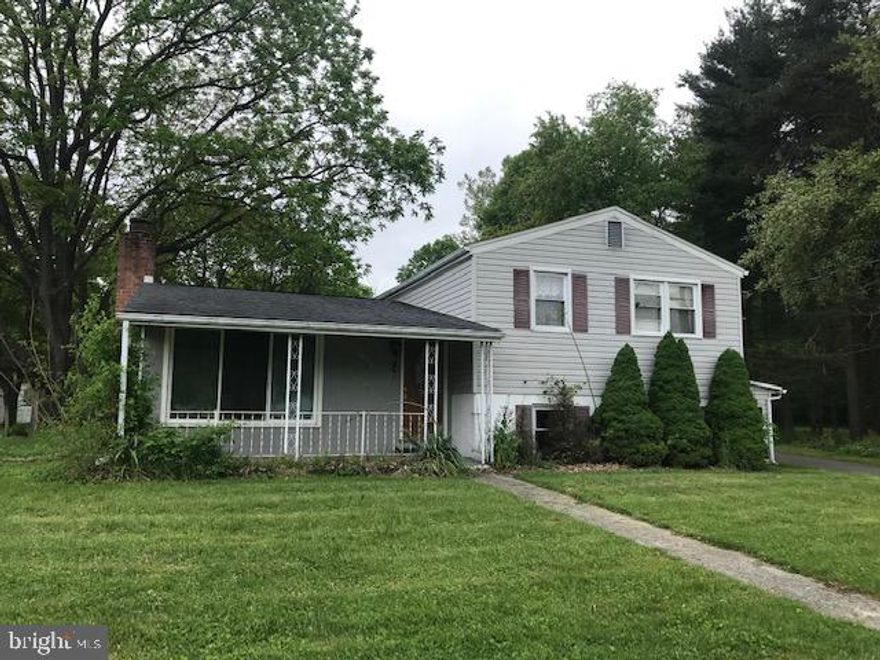 Split level home offering 3 bedroom, central air, 2 car detached garage on over an acre lot.Beautiful setting just outside the city limits.   Additional Tax ID#0116014273 making the total lot 1.11 acres.    As IS Addendum required.