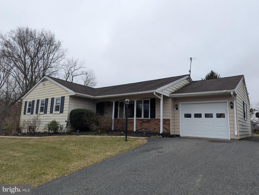 $300,000 LIST PRICE SUGGESTED OPENING BID AT AUCTION. ****NO PRE BID**** AUCTION FRI, April 11, 2025 @ 11:00 AM ON PREMISES. Large private lot at end of Camelot Drive backs to open space. 
 Walk into entry foyer w/ wood like laminate floors. Formal dining room. Crown molding & chair railing. Updated kitchen w/ granite counters, tile backsplash, plenty of cabinetry, breakfast island, LG gas stove, microwave, dishwasher, side by side refrigerator, recess lighting, pantry area, and exit to 1-car garage. (Freezer in garage is excluded from sale). Family room (new addition) w/ exit to stone patio. Digital thermostat. Sunporch area w/ ceiling fan, tile flooring, & sliding doors to outside w/ Trek deck. Whole house fan. Full bathroom in hallway. Bedroom #1 w/ closet. Bedroom #2 w/ closet. Hallway closets. Bedroom #3 (primary) w/ closets. Full bathroom. Lower level has utility room w/ new heat & air for main house area, washer & dryer, utility sink, gas hot water. Finished clubroom. French doors exit to outside. Office room. 2 nd utility room. Bedroom #4 or additional office. Bathroom #3. Working hot tub and pool table included in sale. Public water/ private septic.