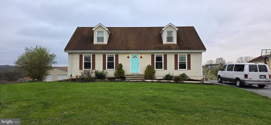 Welcome to this move-in ready cape cod home in the sought-after Red Hawk development, offering stunning views and abundant natural light throughout. The home features neutral, timeless colors and a bright dining room with a picture window that frames beautiful scenery. A finished basement provides flexible additional living space, while newer flooring in the primary bedroom and bathrooms adds a fresh, modern touch. Enjoy year-round comfort and efficiency with a new geothermal HVAC system. Outside, there’s plenty of room for gardening, wide-open views, and a detached building for extra storage. A truly move-in-ready home that blends comfort, function, and views.