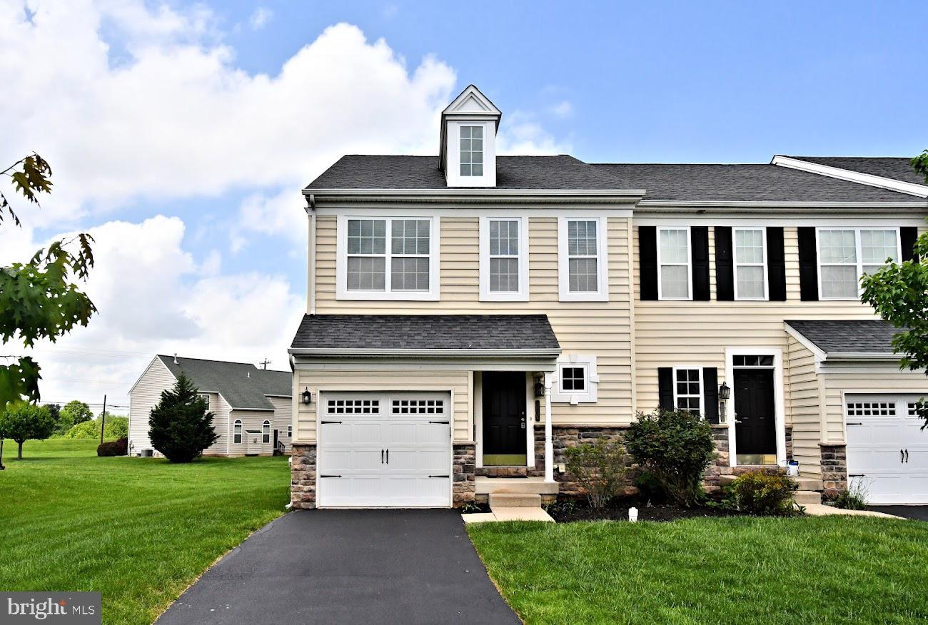 Welcome to our beautifully updated end unit townhome with 3 bedrooms, 2.1 bath located in the desirable Providence Reserve. As you pull up to your new home you will love the curb appeal and location in the community. It's the best. Plenty of parking with the 1 car garage and driveway + the convenient off street parking lot. Be prepared to be impressed. Freshly painted throughout the 1st and 2nd floor! Main level with Virgil Island Oak waterproof laminate wood flooring, brand new carpet up the steps and the 2nd floor. Enter the home off the comfy covered front porch into the open foyer which leads you to our desirable open floor plan! Very comfortable! You will surely enjoy the gourmet kitchen with granite countertops, gas cooking, and stainless appliances. Beautiful kitchen. Off the kitchen you have the dining area and massive great room with a gas fireplace leading to the recently stained back deck. I did say you will love the location! Back inside the main floor also offers 1/2 half bath, garage access. So nice. The 2nd floor boasts 3 nice sized bedrooms and laundry. Big main bedroom with 2 walk in closet and full bath. Gas heat, gas hot water, CA. All brand new window treatments. It's all here. Absolute move in condition. Shows like a model home. Wonderful Opportunity!