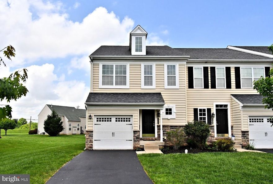 Welcome to our beautifully updated end unit townhome with 3 bedrooms, 2.1 bath located in the desirable Providence Reserve. As you pull up to your new home you will love the curb appeal and location in the community. It's the best. Plenty of parking with the 1 car garage and driveway + the convenient off street parking lot. Be prepared to be impressed. Freshly painted throughout the 1st and 2nd floor!  Main level with Virgil Island Oak waterproof laminate wood flooring, brand new carpet up the steps and the 2nd floor.  Enter the home off the comfy covered front porch into the open foyer which leads you to our desirable open floor plan! Very comfortable! You will surely enjoy the gourmet kitchen with granite countertops, gas cooking, and stainless appliances. Beautiful kitchen. Off the kitchen you have the dining area and massive great room with a gas fireplace leading to the recently stained back deck.  I did say you will love the location! Back inside the main floor also offers 1/2 half bath, garage access. So nice. The 2nd floor boasts 3 nice sized bedrooms and laundry. Big main bedroom with 2 walk in closet and full bath. Gas heat, gas hot water, CA. All brand new window treatments. It's all here. Absolute move in condition. Shows like a model home. Wonderful Opportunity!