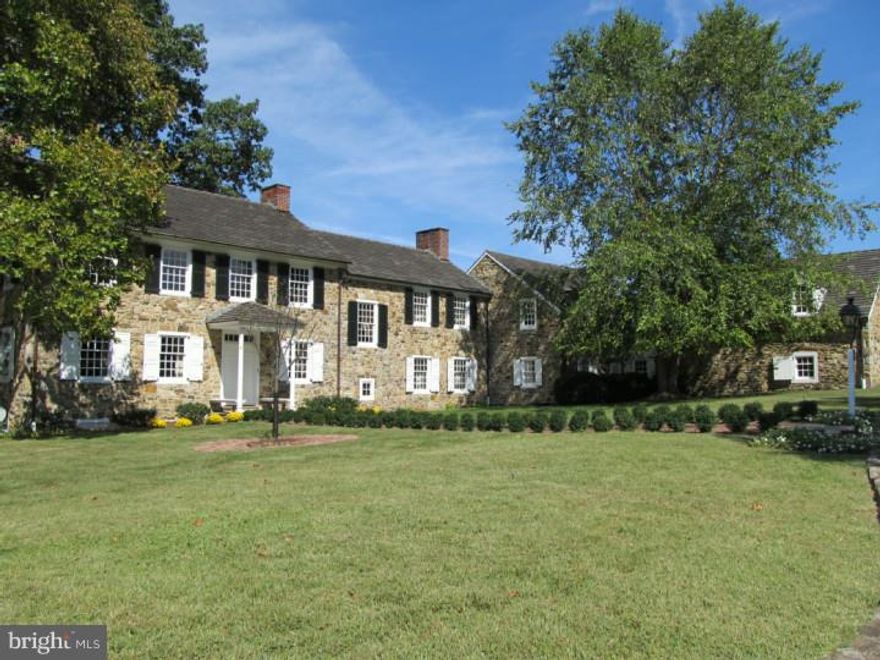 Springhead Farm originating from a 1703 William Penn land grant, is a spectacular 62 acre property and elegant manor house dating back to the early 1800's.  It is truly a one-of-a-kind estate property that most recently was the personal residence of renowned Philadelphia architect, Vincent Kling.  A long sweeping, tree lined, entrance driveway leads to a courtyard entry to this magnificent stone manor house.  The main house shows beautifully and features incredible original period details including: deep window sills, cut nail hardwood flooring, beautiful  wainscoting and finish trim details, eight fireplaces, and outstanding views of the surrounding countryside.  More recent additions include a fabulous family room with custom paneling, a large central fireplace, and a wall of windows with views and access to the garden area.  A flexible floor plan on the 2nd floor allows for 5 or 6 bedrooms and includes 5 full baths.  The main house even features the more recent addition of an elevator.  There are numerous original out buildings on the property, including a 4 bedroom stone tenant house, a smoke house, spring house, root cellar, corn crib, and two barns including an outstanding equestrian area with 6 stalls, a tack room, and a half bath.  One of the barns contains a terrific party/event room also.  Stone patios, terraces, an in-ground pool, and a gazebo complete the exterior.  The surrounding hillsides, vistas and panoramic views are absolutely stunning and seem to go on forever. Don't miss this exceptional once in a lifetime opportunity to own a true piece of Chester County history!  Property is in Act 319, under conservancy, and is not sub-dividable.