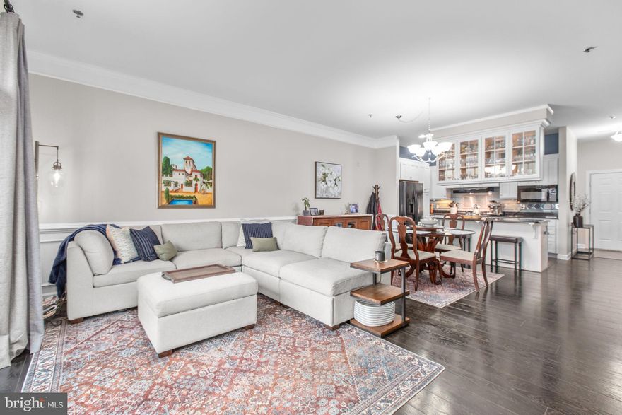 Welcome home to the beautiful Belmont Bay.  This one bedroom third floor unit offers stunning views of the bay, 1 and 1/2 bathrooms, laundry in unit, an assigned parking space, and stunning rooftop views of Belmont Bay.  Dark engineered hardwood flooring flows through the living area and the den with gorgeous built in shelving and work space, The kitchen is a dream with sleek white cabinetry with decorative glass doors, granite countertops, cooktop and tile backsplash. The primary suite includes dual closets, ceiling fan and ensuite bathroom with large soaking tub and separate shower.  The River Club Condos are 24 hr secure access, have a private garage parking (space #10 for this unit), and walkable to the community pool, tennis courts, tot lot/playground, and the VRE-Station.  Living in Belmont Bay is like no other.  The waterfront community has an active social committee which provides events year round and a summer concert series at the Marina.  You are minutes from major commuter routes, shopping, dining, and most recently added shops and a restaurant right in the community.  Don't miss the chance to make this the place you will love to call home.