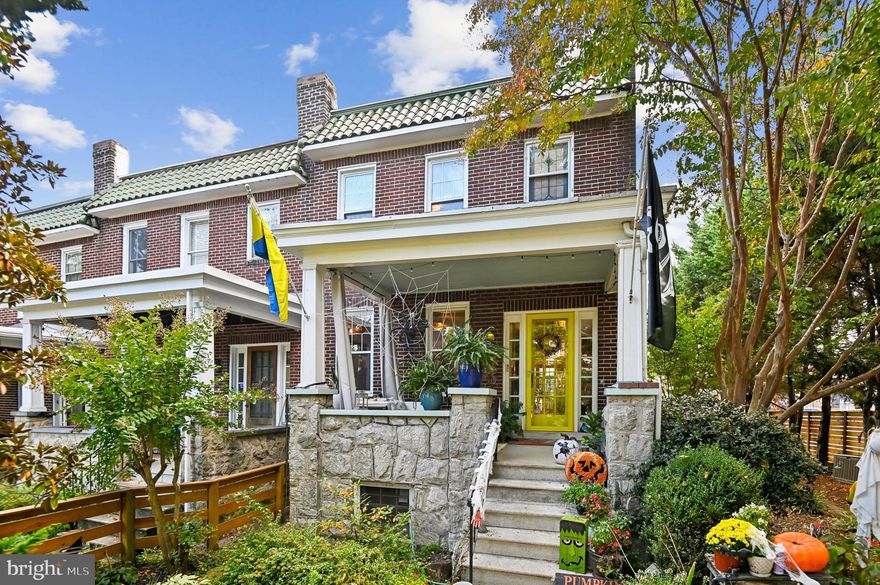 Who says you can’t have it all when it comes to urban living? Walkability, off-street parking, a huge yard with room for a future addition, modern amenities and historic charm all come together in this crown jewel in the heart of Remington’s rowhome community. For the first time in nearly 20 years, this coveted end unit with double lot is available on Cresmont Avenue, a best-kept secret and a magnet for Hopkins faculty. Every inch of property, inside and out, has been lovingly updated and renovated with intentionality, high standards and quality-of-life in mind. Enjoy an unheard of amount of private yard space, complete with professional landscaping and hardscaped patio, mature tree foliage and privacy screening, and an off-street parking pad with a juice-box. Connect with neighbors and enjoy your morning coffee on the front porch, then step inside and find a stunning home that maintains all of the original charm of this 1925 home, alongside a modern kitchen, bathrooms and ample closet space. From the front hall, which features an original stained glass window, watch the late afternoon sun bursting through french doors at the back of the home. An addition that features a custom pantry and breakfast island makes for a supersized galley kitchen. A new dishwasher and refrigerator and custom floating shelves offer a modern contrast to the kitchen’s statement piece, a 1950s GE double oven (fully refurbished). The upstairs features two larger bedrooms with doublewide closets and additional storage space, as well as a hallway coat closet and medicine closet. A smaller, third bedroom can flex from office or nursery space, with a second floor porch to take the unobstructed sunset.
The lower level has been fully renovated and features an additional office, storage space, laundry room and a large common area that doubles as an additional living room by day and guest bedroom by night, with custom built-in murphy bed. Lower level also boasts a new full basement bathroom and walkout entrance to the rear yard.
Beyond the character and charm that awaits within the walls, the incomparable asset of this property lies in the deep backyard and side yard. Adult trees offer a green oasis in an otherwise urban setting, along with a firepit area and hardscaped patio. A new privacy fence hems the space, while carving out off street parking: Head to the grocery store during Remfest without worrying about losing your spot!
The home sits one block from: the south gates of Johns Hopkins University, Wyman Park Dell, R House and Remington’s bustling commercial district. Cresmont Avenue is a two-block, one way street featuring a close-knit community known for their “Cresmont Crawl,” an annual streetwide progressive dinner, a Halloween block party, a fall crab feast and impromptu barbecues and happy hours. Couples will find lifelong friends and found families. This is a magical starter home that might just become your forever home.