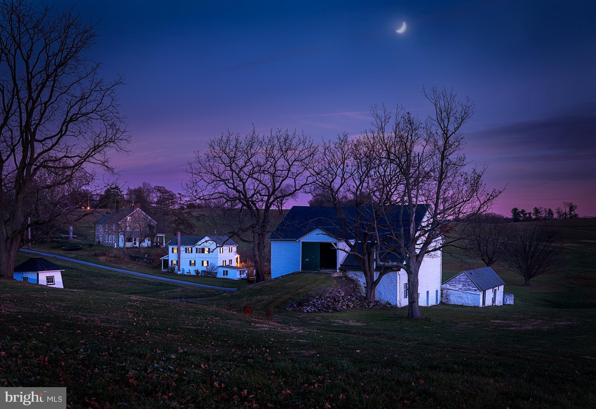 Offered to the market for the first time in over 90 years, this expansive 200+ acre farm spans the width of Providence to Plumsock Roads in scenic Willistown Township, Chester County. Long spans of pastures, hillsides and a perimeter of centennial trees create views that are paused only by five charming residences, two barns, stream, and spring house. Yarnell Run, the stream that widens to a picturesque pond before continuing its path to join Okehocking, remains much as it was when families first settled here in the late 1600’s. The sun rises on the Providence road exposure and sets towards an idyllic four bedroom cottage on Plumsock. The expanse of land provides its own sanctuary and naturally embedded seclusion but, beyond act 319, no conservation easement exists for the 209 acres. Endless views and opportunities exist for this heart of Willistown offering. No access, even if accompanied by realtor without appointment.