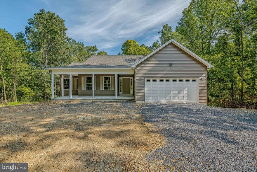 BRAND NEW!! 3 bedroom 2 full bath almost 1,800 finished square feet rancher with full unfinished walkout basement on almost 5 acres of land.  Over 425 square feet 2 car garage.  Gourmet kitchen, island, granite countertops, stainless steel appliances.  If you want a little piece of paradise don't miss out on this property.