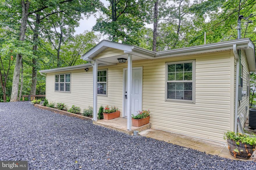 Charming Renovated Ranch in the Wooded Community of Wild Acres 🌲🏡

Welcome to this beautifully renovated 2-bedroom, 1-bath ranch-style home nestled in the serene and private subdivision of Wild Acres. Tucked among the trees, this 960 sq ft home offers the perfect blend of modern updates and cozy charm. Perk is for a one bedroom but home technically has two bedrooms

Inside, you'll find a fully updated interior featuring fresh finishes throughout, with a new well, septic system, and AC unit providing peace of mind for years to come. The bright and open living space flows seamlessly into a well-appointed kitchen, making it ideal for relaxing or entertaining.

Enjoy your morning coffee or unwind in the evening on the cute back deck just off the bedroom—your own little retreat in nature. Whether you’re looking for a full-time residence, a weekend getaway, or a short-term rental opportunity, this home offers easy living in a peaceful, wooded setting.