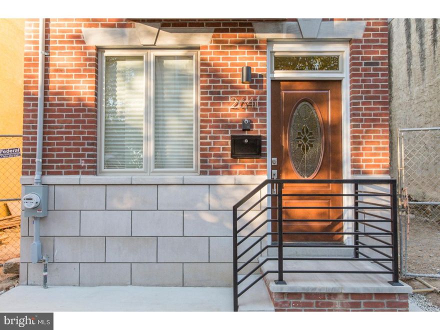 Incredible Value! Nothing spared in this brand new luxury 3 bed, 3 full bath contemporary home in South Philadelphia's hottest developing neighborhood! This spectacular home with over 1900 sq/ft of living space, 9ft ceilings throughout, and amazing roof deck with skyline views features beautiful wide plank white oak flooring, a modern kitchen with granite countertops, breakfast bar with pendant lighting, espresso wood shaker cabinetry w/ under mount lighting and upgraded SS appliances, ultra-modern baths with designer tiles, floating vanities and dual flush toilets. Exceptional features include LED recessed lighting, dual zone high efficiency heating and cooling, audio/ visual intercom system, sprinkler equipped, ADT security system, custom metal railings, casement windows throughout and fully wired for cable, telephone and ethernet in every room. Don't forget the private fenced patio and large finished basement complete with full bath laundry area, plenty of closet storage and the perfect space for media room, private gym or entertaining.. 1 of 3 on homes coming to this block by this builder and additional homes planned by others. 10 year tax abatement pending. 1yr builder's warranty. Minutes to CHOP & University City. A short walk to Washington Ave, only minutes to popular pubs and coffee shops and easy access to all major public transportation.