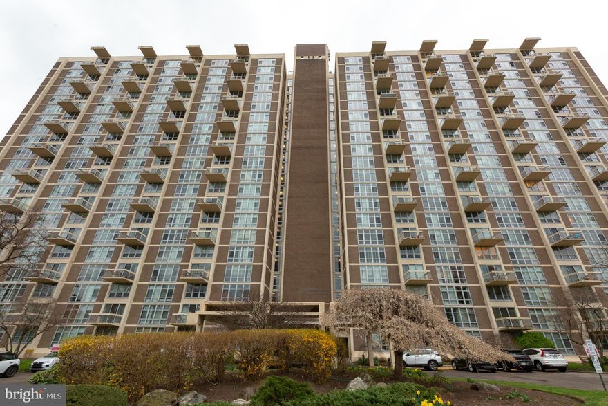 THIS APARTMENT HAS JUST BEEN RENOVATED! A huge 900 sq ft one bedroom apartment with a private balcony, stainless steel appliances, in-unit washer and dryer, and more. There's ample storage and closets throughout and a great separation of space for either an in-home office or other sectioning-off needs. The community amenities include a fitness center, dry cleaner and beauty salon at the lower level, a front doorman and on-site management. There is an electric vehicle charging station in the parking area for on-site recharging. The community offers parking and pool membership at an additional fee. Walking distance to the shops on City Avenue, and a short ride to Center City along MLK Drive. The community is adjacent to Fairmount Park trails for excellent hiking and biking.