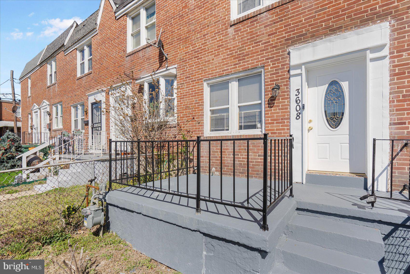 Newly refreshed and move-in ready 2BR/1.5BA brick Townhome located in the quiet neighborhood of Allendale. Make your way to the gated and landscaped front yard, and step up to the front porch of your new home. Step inside to a freshly painted interior featuring textured accent walls, plenty of natural light, and new vinyl flooring. The main floor boasts a spacious living room with an arched opening into the dining room and kitchen. The kitchen offers plenty of cabinets and counter space, a tiled backsplash, stainless steel appliances, and a large stainless sink. Take the staircase to the second floor featuring new flooring in both the spacious primary bedroom and the sizable secondary bedroom, and a full bath boasting the classic black and white tile, and a skylight. The lower level is clean and dry offering additional living space for the entire family to enjoy including a uniquely designed built-in bar, a half bath, storage and laundry. From the kitchen step outside to a semi-fenced yard offering so many possibilities. The rear yard features off street parking with a freshly paved parking pad. This home is ideal for any new homeowner and is located in close proximity to shopping, restaurants, and commuter routes.