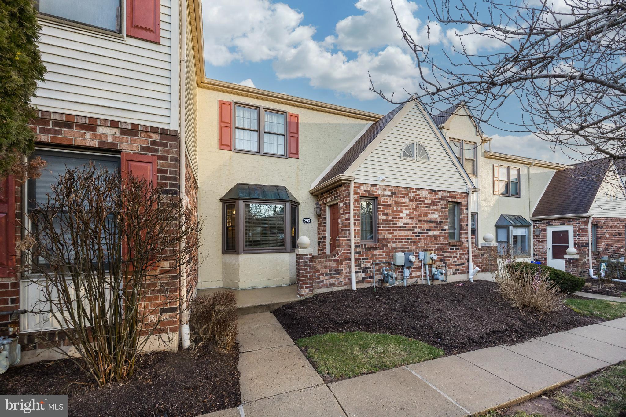 One of the best locations in Trent Manor, this well-maintained townhome is sure to please! Gleaming hardwood floors grace the first floor. Convenient coat closet in the foyer. The living room is flooded with natural sunlight. Kitchen has 36” oak cabinetry, tile backsplash, gas range, and dishwasher. The kitchen connects with the nice dining area and family room with brick, wood-burning fireplace, which will be a cozy place to enjoy a fire on a cold winter night! The dining room has sliders which lead to a deck overlooking a private, tree lined back yard. A remodeled powder room completes the first level. Second floor has a primary bedroom with ensuite bathroom, completely remodeled, with nice size walk-in shower that has beautiful 12x12 travertine tile and glass door. Two additional bedrooms and a hall bath, also completely remodeled with tile surround, quartz countertop, and tiled floor. Finished basement provides lots of room for entertainment, game room, office space, storage and more. Icing on the cake is the newer HVAC system (2019), replacement windows (2017), front door and rear slider (also 2017). All of this in a very popular neighborhood so convenient to local commuter roads, including Routes. 422, 202, 76 and the Turnpike, as well as endless shopping and restaurants! This is low maintenance living at its best!