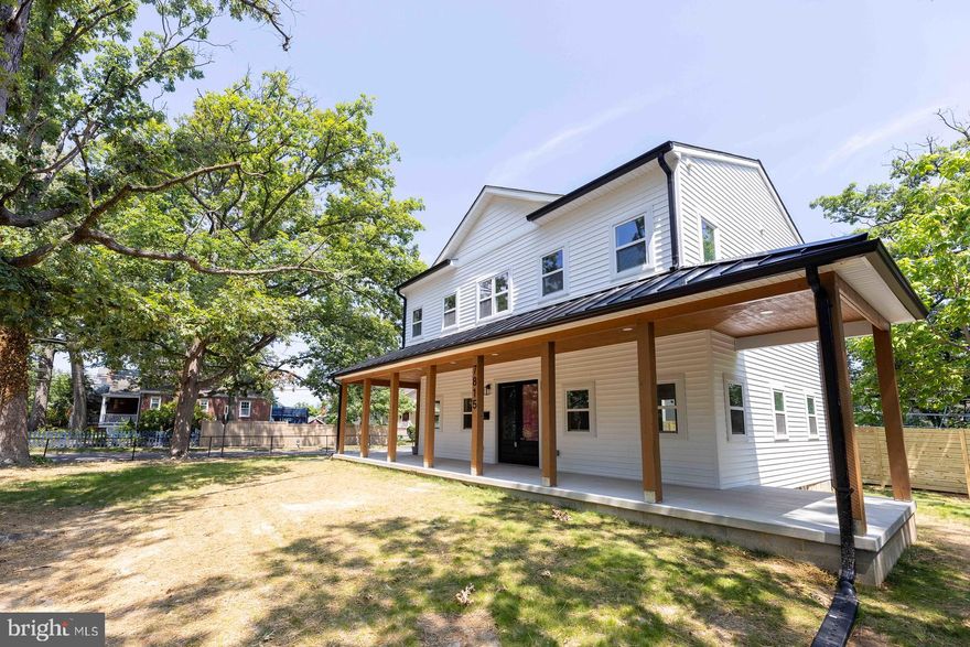 Total Transformation in the City of Takoma Park.  NEW CONSTRUCTION at the price of resale! You have to see it to believe it. All new electrical, plumbing, HVAC, framing, roof… you name it. IT’S ALL BRAND NEW.  Natural light floods the home. Custom kitchen with 42” soft close wooden cabinets and full backsplash quartz countertops.  A tailored hood range & all new stainless steel appliances complete the kitchen. Cozy up by the wood burning fireplace. The main level has a half bath. Upstairs you’ll find four bedrooms & three bathrooms.  The primary bedroom has its own private bathroom complete with a double vanity sink & modest shower. The suite also has a walk-in closet.  The 2nd primary also has a private  bathroom with a large shower.  The last two bedrooms share a private bathroom which has a tub-shower combo, double vanity & built in storage. The basement has a full bath & an exterior walk-out door. It’s a finished space ready to fit your needs. You’re just a block away from a park featuring courts for basketball, tennis & soccer.  It has a playground & an open field for outdoor enthusiasts. Conveniently located to multiple modes of public transportation & major commuting routes. Metro’s new purple line is in construction minutes away. Do your shopping at nearby Whole Foods & Target. Lots of dining options within reach. Contact the Listing Agent for a private showing today!