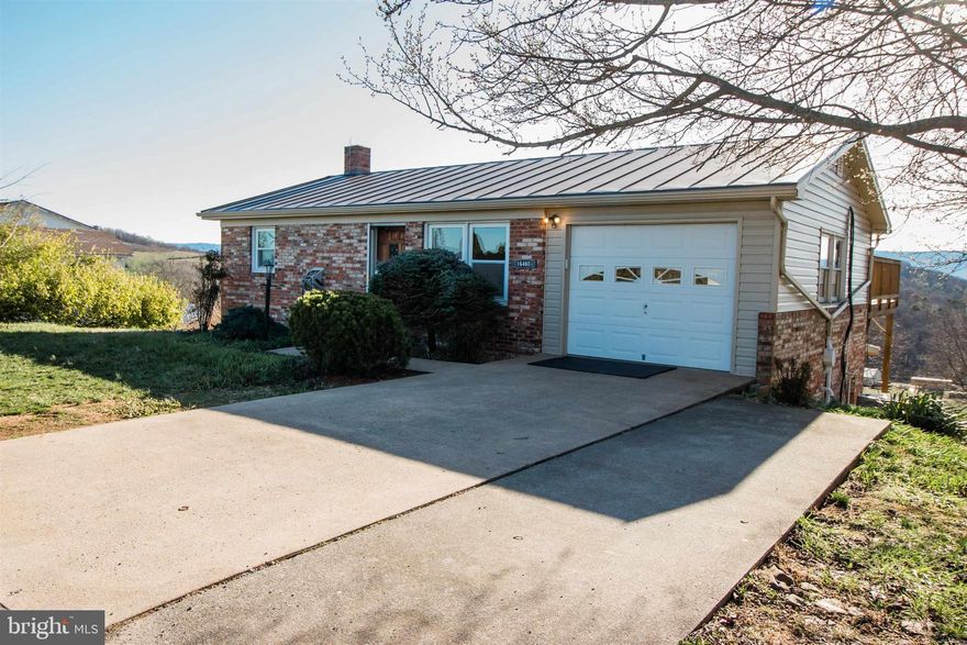 Cozy, country charmer ready to be your next home! Come check out this well-kept ranch home with AMAZING views off the back porch! This home boasts 2 bedrooms and 1 bath upstairs while providing tons of storage/expansion in the basement. The basement also hosts a half bath/laundry room and additional finished room. At this price, this one won't last long!