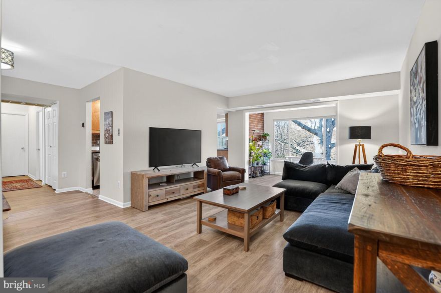 Welcome to this beautifully renovated and thoughtfully upgraded condo in the highly sought-after Vistas Community—offering turnkey living with elevated finishes throughout.
From the moment you enter, the welcoming foyer opens effortlessly into expansive living and dining areas, perfectly designed for both comfortable everyday living and elegant entertaining. Freshly painted in a soft, modern palette and complemented by updated flooring, these spaces feel bright, cohesive, and completely move-in ready.
Just off the living room, a light-filled enclosed sunroom with charming exposed brick and expansive windows creates a warm and versatile retreat overlooking a mature oak tree. Whether used as a home office, reading lounge, or playroom for children, this flexible space adds both functionality and character to the home.
The renovated kitchen is both stylish and highly functional, featuring 42” soft-close cabinetry, granite countertops, a double under-mount sink, and a sleek glass backsplash with metal accents. It is equipped with a new refrigerator, a five-burner stainless steel stove, built-in microwave, and dishwasher—ideal for both everyday living and entertaining. The adjoining breakfast area offers built-in cabinetry and winecooler, creating a cozy yet refined dining space. A new stacked washer and dryer, along with a pantry, are conveniently located just off the kitchen.
The spacious primary suite comfortably accommodates a king-sized bed and features a large walk-in bay window along with a generous walk-in closet. The fully renovated primary bathroom offers a spa-like experience with a large, separate shower, designer tilework, updated ceramic flooring, and modern lighting.
The second bedroom is well-sized with ample closet space, perfect for guests, family, or a secondary office. The second bathroom has also been fully renovated, offering updated finishes and a clean, modern aesthetic.
Additional thoughtful upgrades include a new water heater, Ecobee smart thermostat, two new windows, and fresh paint throughout, enhancing both comfort and efficiency. A large utility/storage room and linen closet provide excellent additional storage within the home.
Ideally located just minutes from Metro access, I-66, Tysons, Reston, Oakton, Vienna, and the City of Fairfax, this home offers exceptional convenience while maintaining a peaceful residential setting.
Residents of The Vistas enjoy access to outstanding community amenities, including a pool with sauna, tennis courts, basketball court, nearby parks, walking and biking trails, a dog park, and green open spaces. The building also offers additional storage for bikes and seasonal items.
Beautifully updated, incredibly versatile, and ideally located—this is a true turnkey opportunity not to be missed.