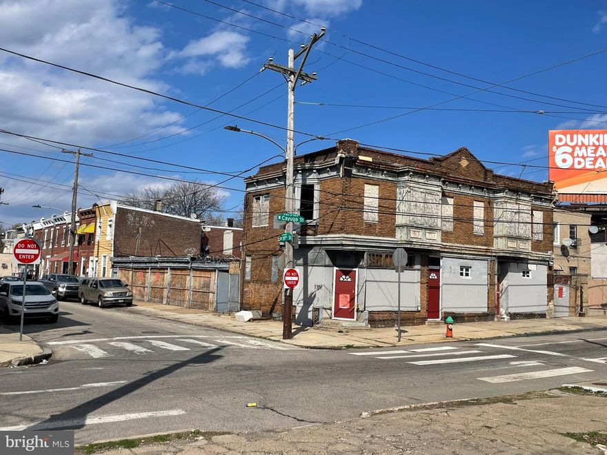 Attention Savvy Investors, Contractors and Developers: total renovation required! Residential mixed use commercial property in prime location of rapidly developing area. Previously it was an apartment building and licensed auto repair shop, this property provides endless business opportunities or could be divided to single-family dwellings.