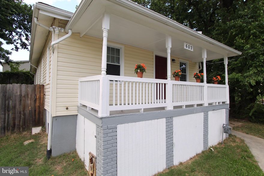 Adorable Raised Rambler in quiet neighborhood, 4 BR, 2 full bath, fully renovated kitchen w/all new stainless appliances & floor and table space.  Resilient bamboo flooring, ceramic tile in bathrooms. Fully finished basement including full bath with fully separate entry.  Large fenced yard perfect for entertaining family & friends. Large front porch.Close to B/W pkwy for commuters.  Move in ready.