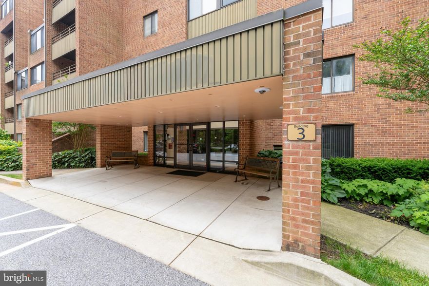 Here is your opportunity to live in in Towsongate Community in Towson!  This 2BR 2BA condominium is located on the end of the floor and is one of the largest units in the area.  This unit offers wood floors upon entering the foyer.  The wood floors continue to the kitchen where the cabinets have been updated to beautiful smooth wood cabinets, a gorgeous green granite countertop and stainless appliances.  The living and dining areas are extra large and have custom carpet.  The hall bath has Corian counters, and custom wallpaper themed with the carpet in the living area.  The primary bedroom has an en suite bath with Corian vanities and beautiful tile in the shower.  There is also a separate utility room for laundry and storage. This building offers lots of parking for condo owners and their guests.  The building is secure with a locked entry and the grounds are beautifully landscaped. More photos to come.