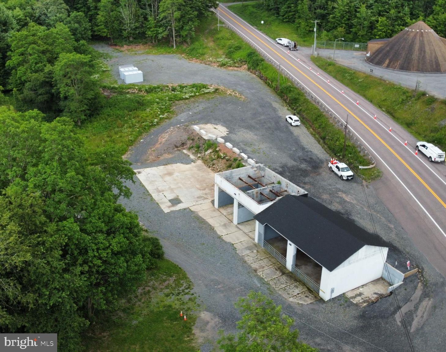 Welcome to 3501 George Washington Highway, a premier property containing 2.86 acres of prime land perfect for commercial and investment endeavors. The property features a recently renovated garage with four spacious bays, providing versatility for automotive, storage, or workshop purposes. The large gravel storage lot and concrete pad are ideal for all outdoor storage needs. Two metal storage containers that provide additional protected storage are also included with the property. Situated along George Washington Highway, this property benefits from high visibility and easy access, making it an attractive location for businesses. Contact today to see it yourself!
DISCLOSURE: RAILEY REALTY IS NOT THE CARETAKER OF PROPERTIES LISTED BY IT. DURING INCLEMENT WEATHER CONDITIONS, PROSPECTIVE PURCHASERS AND THEIR AGENTS ASSUME ALL LIABILITY ASSOCIATED WITH OR BY WEATHER AT THE PROPERTY.