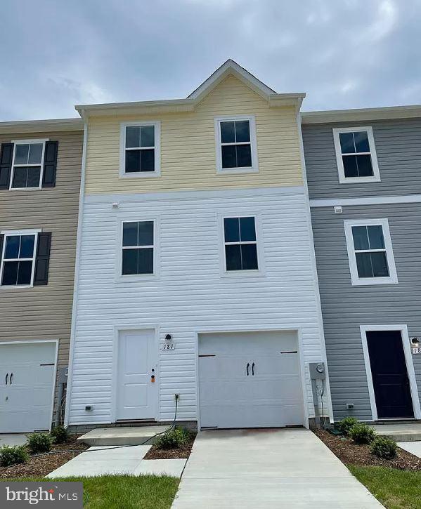 This Property is located at Dillon Farm in Hedgesville, WV. This 3-level Townhome has 3 Bedrooms, 2.5 baths, Granite Countertops, and fully upgraded appliances with Farmhouse package upgrades. This home has easy access to many nearby stores, Burger King, Martins, and other stores. Also easily accessible to Pharmacy/Medical centers / Route 9 and I-81. Perfect location for those who work in Virginia, WV, PA, and Maryland. It’s the center point of all 4 states for easy commute. This Home has Front Entrance Attached Garage with Inside Access. In the Entry level, Finished Recroom / Office Room/Bedroom(you use it as the 4th Bedroom)... The main level comes with an open-concept floor plan which has a Living room / Kitchen and Dining. The kitchen has fully upgraded appliances (Double door steel Refrigerator, Dishwasher, and Microwave) with Granite countertops. The 3rd level has a Master Bedroom with a Master Bath, and 2 Children's Bedrooms (A total of 3 Bed Rooms and 2 Full baths). Laundry Washer /Dryer is in Unit, Energy efficient windows, Gas for Water heating/ Room Heating. Pets are allowed. The security deposit and first month are due when you sign the lease. May not last long at this Home in the Market, Call or schedule the tour !!!