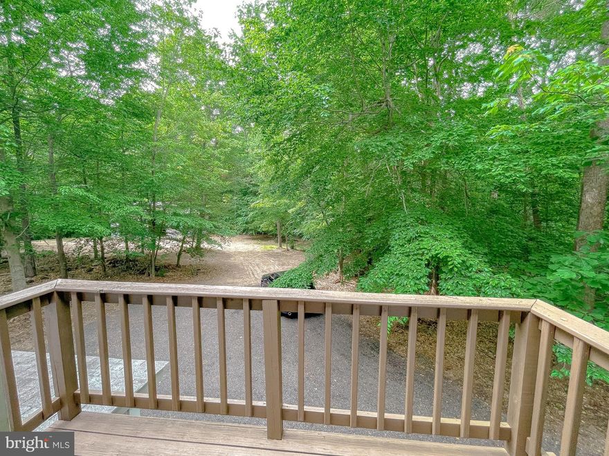 You want privacy, here it is!! Property consist of 2 parcels. The main parcel  is 13.93 acres and the second parcel is 18.68 acres.  Total of 32.6 acres!!  The main parcel has a 3 bedroom 2 full bath with a fireplace and unfinished walk out basement.  Two huge outbuildings.  36x40 and a 28x24 for all your toys.  The 28x24 has additional space upstairs. The second parcel is perked .  Build another home .  Sold as is.