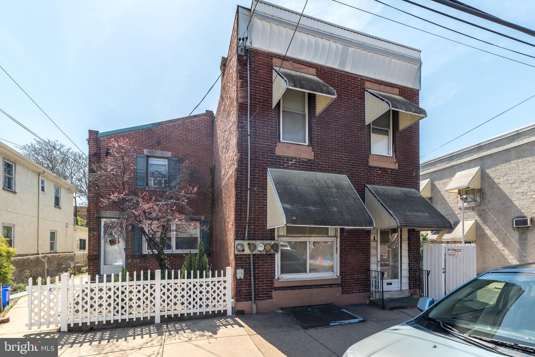 Very large 2,560 sq ft residential corner property with covered side space that runs the length of the property. It has 2 garages (currently a workshop and storage) that can also be rehabbed along with the house. The property runs along a no outlet street that appears to belong to this house and the one across it, allowing for 3 cars to parallel park adjacent to this house. This property is a full rehab, perfect for an investor or user looking for twice the usual space under one roof.