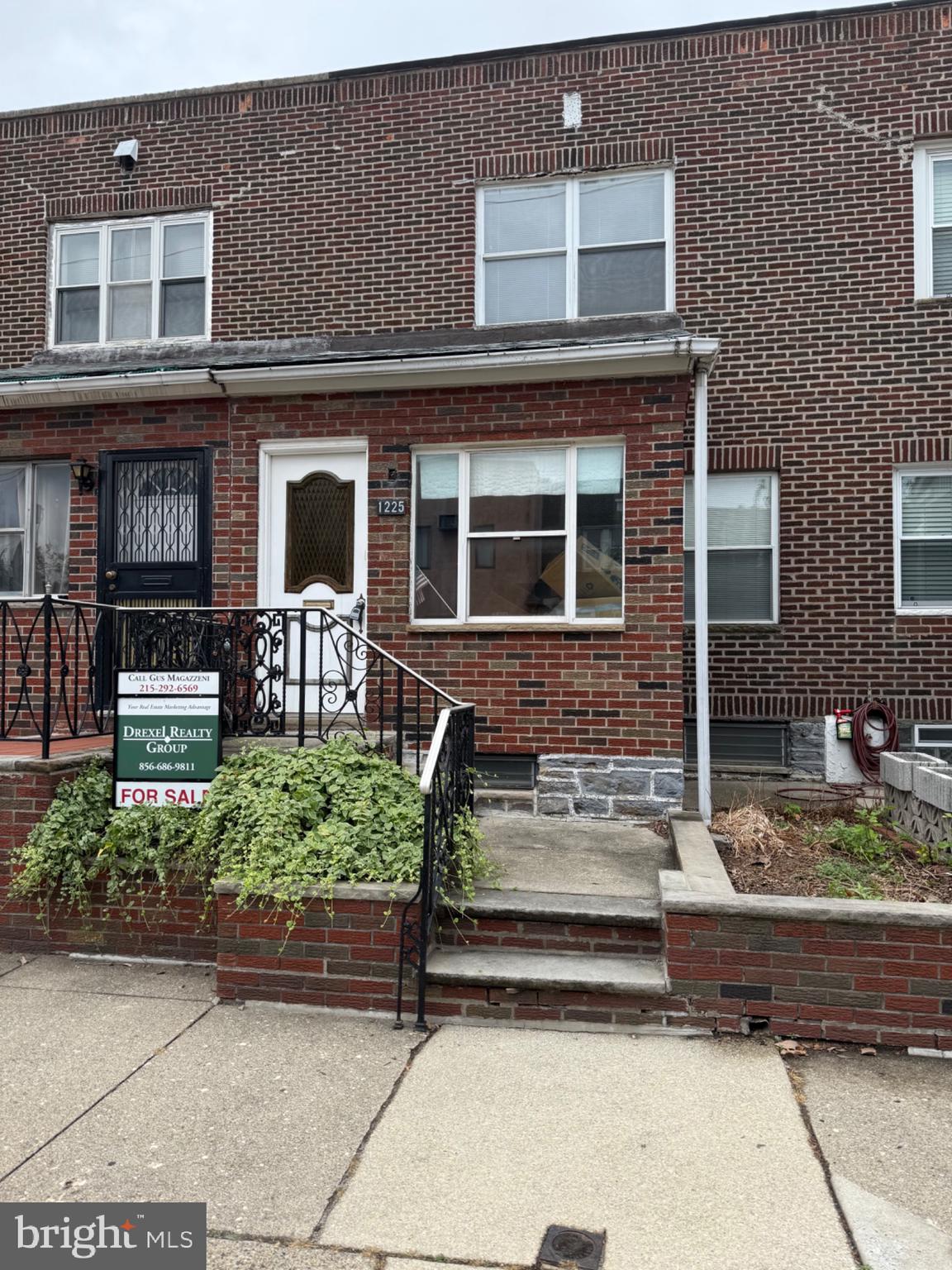 Welcome home to one of the best locations in Marconi East, only a stone's throw from the park! This home has been lovingly cared for by the last owners, providing you with a unique opportunity to create your own dream home in a great neighborhood. As you enter, plenty of natural light greets you in the bright indoor porch, ideal for a plant haven or just for reading and relaxing. Then step inside the open-concept, spacious living room complete with a built in bookcase, wood trim and special finishes. The living room flows seamlessly into the formal dining room, which includes an angled coat closet, perfect for entertaining or for enjoying special meals with your family. The eat-in galley kitchen features quality wood cabinets, dishwasher, and lots of natural light. Upstairs you'll find 3 bright bedrooms, a hall linen closet and a full bath featuring tile and a skylight. Downstairs, the full finished lower level has a wonderful family room, featuring real stone accents, custom woodwork, and a real stone faux fireplace. Built in areas provide extra storage space, as well as a convenient and bright laundry room, with access to the great backyard patio ideal for barbecuing and al fresco dining. This home also features central air for year-round comfort. This quiet location is just a few blocks from lots of excitement, great food and entertainment, including the Philadelphia Sports Complex, Live! Casino, Chickie's & Pete's, Termini Bakery, Celebres, and so much more. Marconi Plaza is a beautiful open space, with easy access to the Broad Street line and everything that center city has to offer. Don't miss this ideal opportunity to live in this wonderful neighborhood.