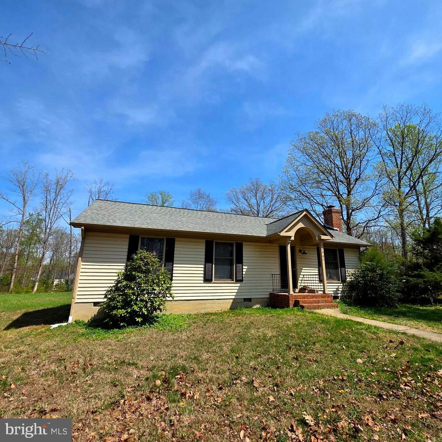 Updated 3 Bedroom, 2 full Bath Rambler is move-in-ready! Located on 1/2 acre corner lot in Lake community.  Brick wood burning fireplace with solid wood mantle in living room, hardwood flooring in main living areas, carpet in all 3 bedrooms, tile flooring, vanities and fixtures in bathrooms! The eat-in-kitchen is full of light with a vaulted ceiling, 2 skylights and sliding glass door that opens to a large back deck, perfect for outdoor dining and entertaining. The primary bedroom features a walk-in closet and attached primary bath. The amenity filled subdivision of Lake Wilderness includes community pool, playground/tot lots, lake, Club house, tennis courts, basketball courts and so much more!