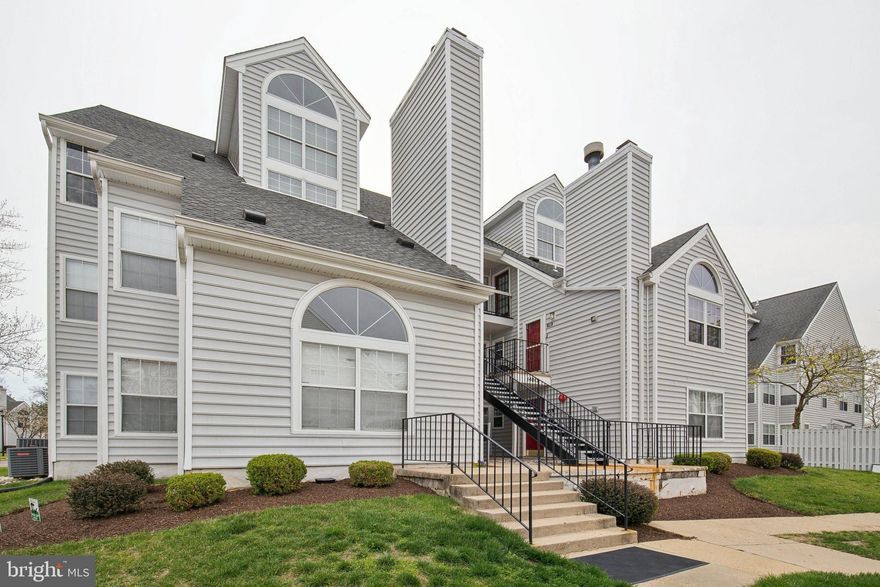 BEAUTIFUL CONDO - Move-in Ready - nestled in the highly sought-after VISTAS AT LAUREL LAKES in the beautiful Prince Geore's County, Laurel, MD!  This nicely updated 2nd-level condo is conveniently located within walking distance to shopping, groceries, eateries, recreational parks, playgrounds, athletic fields and more!  Featuring TWO LARGE BEDROOMS with great closet space, TWO UPDATED FULL BATHS with custom tile work, UPDATED KITCHEN with MODERN STAINLESS APPLIANCES, granite counters and bar seating space, a spacious family room with VAULTED-CATHEDRAL HIGH CEILINGS, ceiling fan, wood burning fireplace and a beautiful Palladian window!  Off from the family room and kitchen you will find the separate dining space offering bright windows overlooking the picturesque community!  The large primary bedroom features a walk-in closet and an attached updated full bathroom with extra cabinet storage space. The second bedroom is equally spacious with two spacious closets. The updated hall bathroom offers a tub-shower combo, vanity with storage space and beautiful tile flooring.  Gorgeous wood laminate planks throughout the family room, dining area and kitchen for a seamless look!  Open concept living and lots of natural lighting! Laundry area with full size stackable washer and dryer.  Foyer area with coat closet and hallway linen closet for added storage! Gated balcony off from entryway. Other features and upgrades include newer HVAC system (2023), newer hot water heater (2023) and newer windows!  Convenient to commuter bus routes/trains, schools, major highways (capital beltway/I-95/495, US Route 1/Balt Ave, MD-100, MD-32) major airports (BWI, Reagan National) and military installations (Ft Meade, Andrews AFB, Bolling, Pentagon). Quick access and walkability to restaurants, eateries, shopping, groceries, walking/jogging/biking trails, parks, playgrounds, Robert J DiPietro Community Center and Cypress Street Athletic Field.   Easy commute to Laurel Towne Center, Laurel Lakes, Granville Gude Park & Lakehouse, Laurel Museum, premier sporting and entertainment venues (Laurel Park - Race Track, PG County Sports and Learning Complex, Bowie Baysox). Accessible to Baltimore National Harbor, National Harbor, MGM, Washington, DC, Northern VA and surrounding counties! Come enjoy this leisure lifestyle that's waiting for you!  Schedule a tour today!
