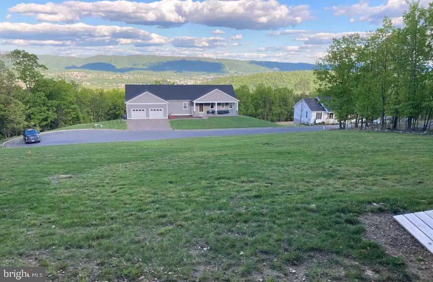 Magnificent hilltop mountain views at the most sought after community in Cumberland. The last lot in a peaceful Cul de sac community. All city utilities are set and ready curbside to be hooked up. Approved for 4 bedrooms. Don’t miss this beauty. Priced perfectly. Will go quickly.