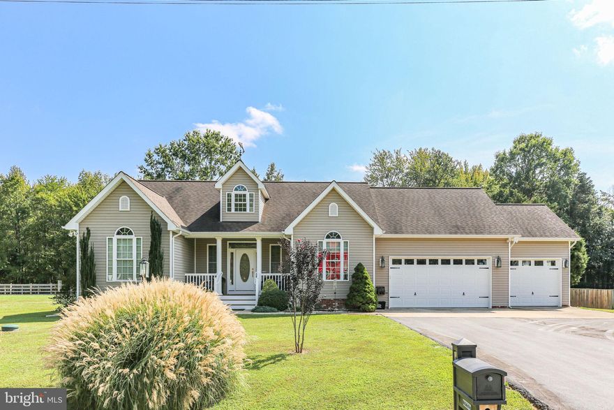 The perfect blend of comfort, convenience, and waterfront lifestyle! ***Fios internet*** 3 Car Garage*** This meticulously  maintained 3-bedroom, 2-bath home offers water views and community water access—a rare find with a voluntary HOA of just $300/year. Open-concept floor plan with main level private master bedroom.  Kitchen features granite countertops, brand-new refrigerator and microwave. Built-in 4-speaker surround sound along with TV, sound bar and subwoofer (Bluetooth ready) that convey. Office TV also conveys! New water heater (March 2024) and new water softener add efficiency and peace of mind. New septic pumps. Outside enjoy the stamped concrete patio, perfect for BBQs or quiet evenings overlooking your large, flat yard. Whole-house generator, garage cabinets, two ladders, copper weather vane, and safe also all convey.  This is a rare find - don’t miss your chance! Call or email today to schedule your showing!