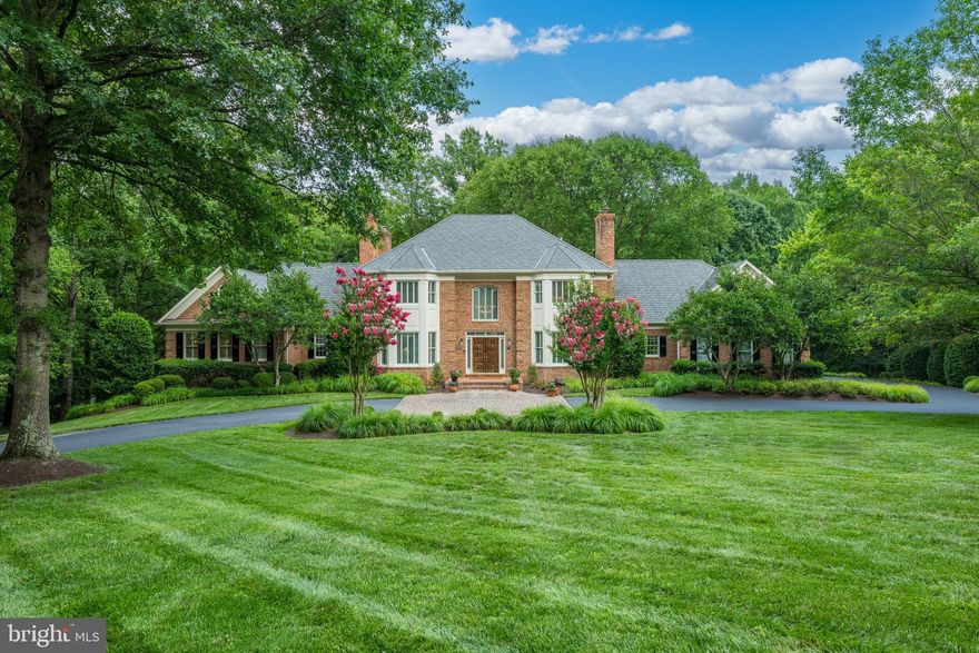 EXCEPTIONAL NEW OFFERING IN VIENNA.  This custom-built residence, tucked away on a no-through street in Vienna's sought-after Hunters Crest neighborhood, is sited on a spectacular 2-acre lot with strong curb appeal just minutes from downtown Vienna and all major commuter routes. With over 8,800 square feet of finished living space, including 8 bedrooms, 8 full bathrooms, and 1 half bath, this stately home will delight the most discriminating buyer. Rich in detail, with elegant moldings and millwork throughout, the home features a main level primary suite, generous-sized principal rooms, and lovely outdoor spaces, including an expansive deck with picturesque views, screened porch, and patio.  This thoughtfully designed home features ensuite bedrooms, a bonus loft room, and a spectacular lower level with abundant windows with a recreation/media room, gaming and billiards area, kitchenette, exercise room, and additional bedrooms and baths.  This is truly the perfect place to call home!