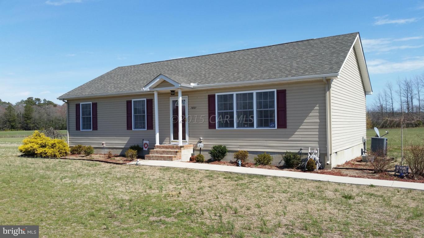 Great country setting with 2.54 acres. This home is clean and neat as a pin with large rear deck and outbuilding!