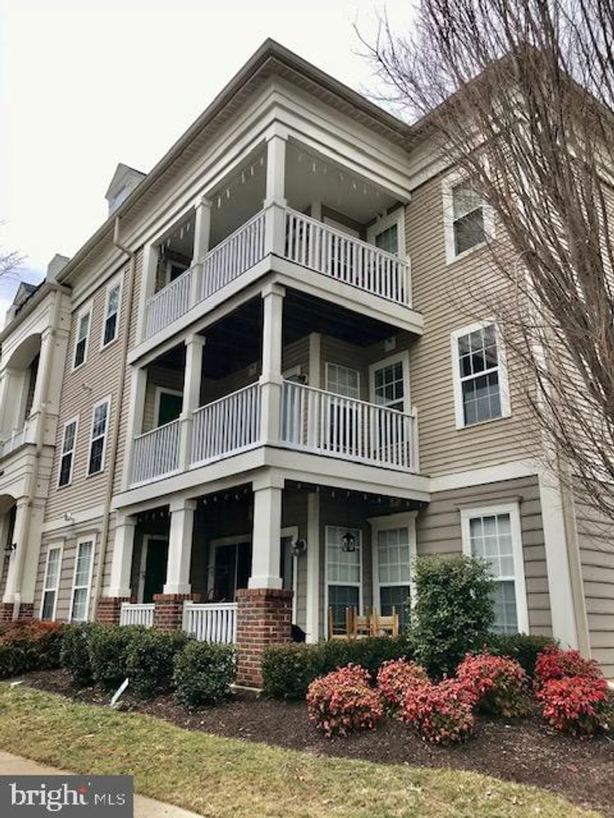 READY TO MOVE IN! FRESH PAINT, NEW FLOORS, STAINLESS STEEL APPLIANCES, 2 BEDROOMS 2 FULL BATHS, FIREPLACE, BUILT-INS, HGE WALK-IN CLOSET IN MASTER BR, CONVENIENT LOCATION...WALK TO SHOPPING, RESTUARANTS, TOT LOTS, PLAY AREAS, PARK! FEW MINUTES TO MARC TRAIN, ON BUS LINE. AMENITIES GALORE!!!