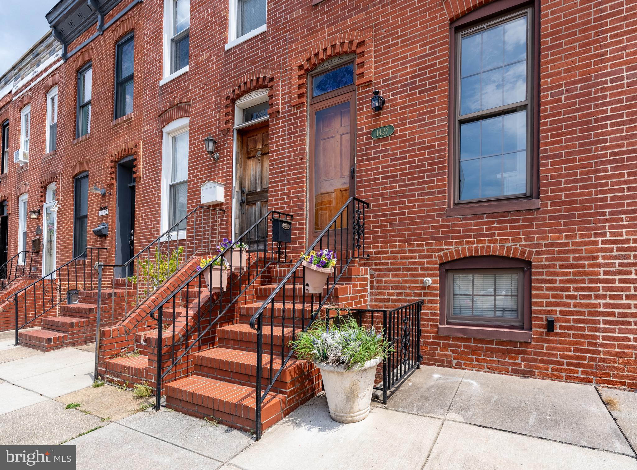 OFFER DEADLINE: Saturday, 8/9 at 5pm! Welcome to 1427 Patapsco Street, a charming rowhome with parking pad! Located in the vibrant heart of Federal Hill, Baltimore, this inviting residence seamlessly blends historic charm with modern convenience. As you step inside, you're greeted by a cozy living area that leads into a thoughtfully laid-out kitchen, perfect for culinary creativity. This home features two spacious bedrooms, providing ample space for relaxation and rest. The single bathroom is well-appointed, offering both functionality and style. Convenience is key, with an in-home washer and dryer that streamline your laundry routine, ensuring ease and efficiency for your everyday living. Positioned in a historic district, this rowhome stands as a testament to timeless design. Its classic façade and interior details echo the rich architectural heritage of Baltimore while offering the comforts of contemporary living. Whether you're a first-time homebuyer or seeking to downsize, this property presents an ideal opportunity to embrace urban living without compromising on comfort. The surrounding neighborhood offers an array of amenities and attractions, making it a perfect setting for anyone looking to enjoy the vibrant culture and dynamic lifestyle of city life. Discover the potential of this delightful townhouse at 1427 Patapsco St and envision your new life in one of Baltimore's most sought-after locations. Contact us today to schedule a viewing and make this charming abode your new home.