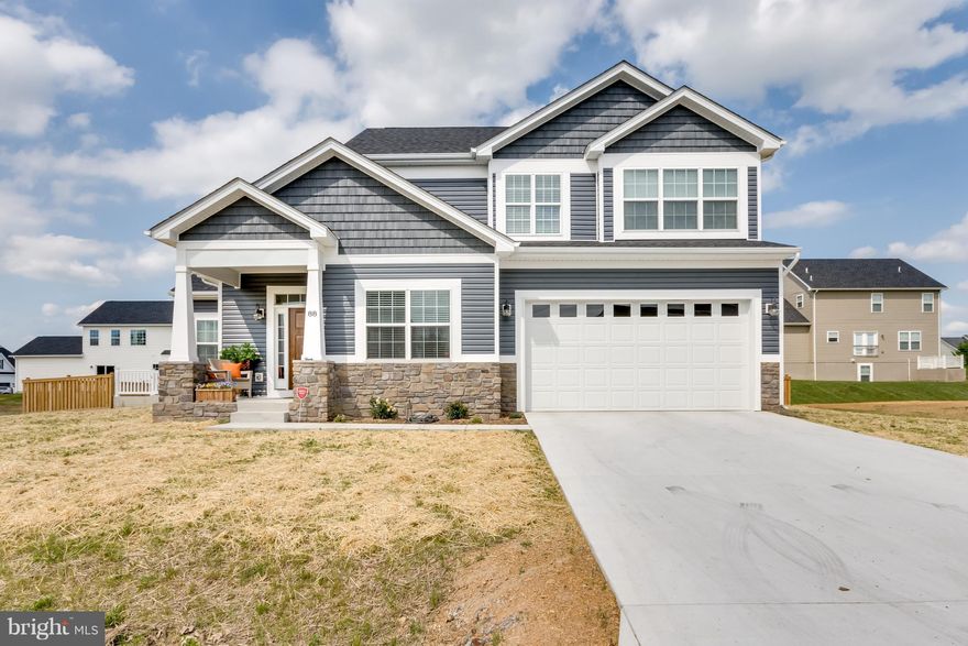 New Gorgeous still under 1 yr Builder Warranty.  Absolute Best amenities: granite counters, soft close drawers, touch faucet, 5 burner gas cooktop, copper farmhouse sink, wood floors, 9' vaulted ceilings, gas fireplace, wood plank fencing, expensive lighting fixtures-all convey.  If you are thinking of buying a new home  see this home. It's new & you can move right in.