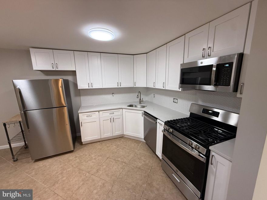 Huge one bedroom — Just renovated . . . so you don’t have to !!!  Brand New white shaker style Kitchen cabinets With Quartz counters in kitchen and bath. - Tiled kitchen floors
new engineered wood flooring  In living room and bedroom -Sun filled living room  exits to your private outdoor space . Huntley Square community offers  welcoming outdoor pool, extensive common areas and plenty of parking right out front.
Adjacent popular  Rosecroft Shopping Center  - that’s convenient- and distance is  Less than 5 miles to National  Harbor!  Easy access to jump on 495 And head towards Virginia or In DC