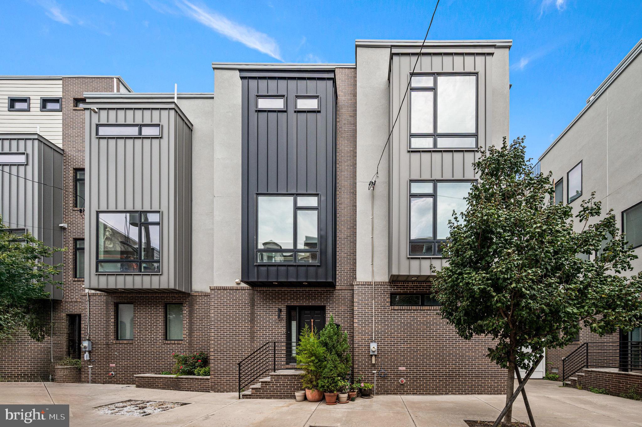 Urban Opulence Meets Distinctive Modern Living. Welcome to 105 Alter Street, a home that offers an exceptional sense of space and scale, with a layout that feels more expansive than most Philadelphia residences—thanks to its rare, extra-wide design that’s nearly impossible to find in the city. Professional photos and floor plans will be available soon.
Offering 1 CAR PRIVATE GARAGE PARKING, this 3-bedroom, 2.5-bath home is filled with natural light, enhanced by oversized bay windows and thoughtfully designed living spaces. Built with high-quality construction materials and modern, refined finishes, every room balances comfort with contemporary sophistication.
At the top, a huge pilot house with elegant French doors leads to an oversized private roof deck, where sweeping views of the Philadelphia skyline and Delaware River await—your own urban sanctuary. There is also a half bathroom on the top level, which is incredibly convenient while entertaining.
Additional highlights include a private recreation room, highly sought-after private garage parking, and a location that’s just steps from Penn’s Landing, the Italian Market, and South Street, with easy access to I-95, I-676, and I-76. Additionally, the Washington Avenue Connector Project has been approved and is well underway, bringing significant value to the area by linking South Philadelphia with the Delaware River Waterfront. Key improvements include multi-use paths and sidewalks, parking-protected bike lanes, enhanced pedestrian lighting, new trees and landscaping, and a complete repaving of Washington Avenue from Columbus Boulevard to 4th Street. Plus, take advantage of the remaining approved tax abatement—adding long-term value to an already exceptional home.
This is urban living without compromise—where style, space, and substance come together beautifully.