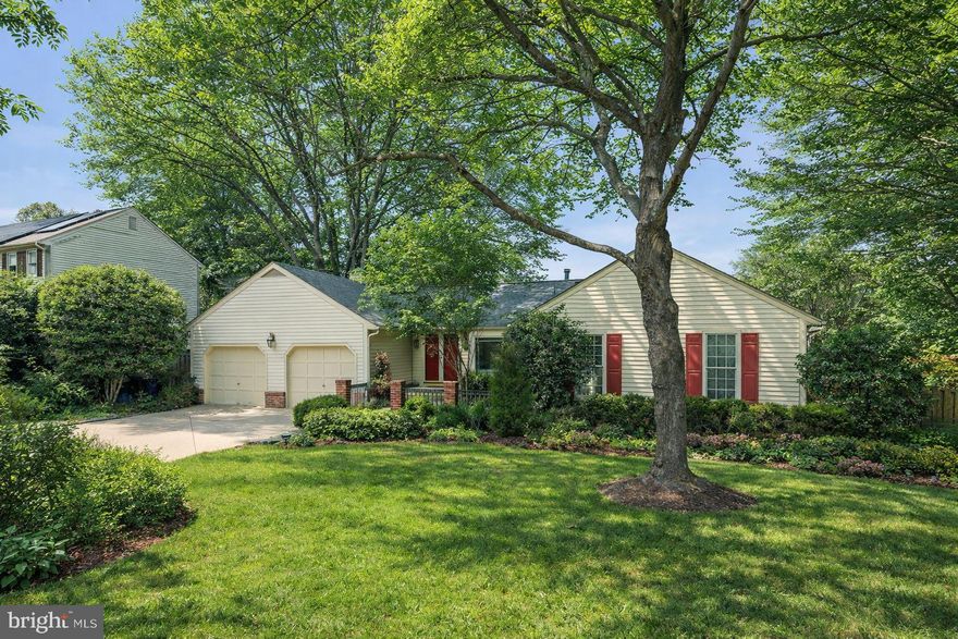 Discover 9201 Copenhaver Drive, a seldom-seen two-level rancher with contemporary updates throughout,  in the sought-after Copenhaver neighborhood.
 Set on a .35-acre lot, the home provides 3,976 total square feet of living space over two finished levels, with 5 bedrooms, 2 full bathrooms, and a powder room.
 An abundance of high-end upgrades by the current owners include: NEW HOT WATER HEATER (2026), KITCHEN RENOVATION (2023), NEW KITCHEN APPLIANCES (2023), SUBPANEL AND NEW ELECTRICAL WITH EV CAPACITY (2023), RADON SYSTEM INSTALLED (2023), NEW HARDWOOD AND ENGINEERED HARDWOOD FLOORS (2022), WHOLE HOUSE VENTILATION SYSTEM (2022), SPRAY FOAM INSULATION ADDED (2022), SECURITY SYSTEM (2022), NEW SHADOWBOX FENCE (2022), NEW RETAINING WALL, EXTENSIVE LANDSCAPING, AND MORE!
 One of the home’s standout features is the private, fully fenced backyard retreat with multiple access points. This tranquil space features extensive greenspace, rear and side patios, and two new garden sheds. The impressive landscaping offers an irrigation system, raised solid cedar garden beds, an abundance of flowering varieties, and numerous fruit trees and berry bushes—apple, pear, plum, nectarine, fig, raspberry, blueberry, blackberry, gooseberry, and more—perfect for relaxing or entertaining!
 A flagstone walk and double doors welcome you to this spacious home. The 2023 gourmet kitchen renovation showcases quartzite countertops, custom solid-wood cabinetry by Watkins Cabinet Company, stainless steel Café appliances, and a high-end range with induction cooktop and convection oven. A pantry, breakfast area, and large matching island with bar seating add everyday convenience and style. A sliding glass door opens to the side patio, where a remote-controlled awning helps keep both indoor and outdoor spaces cooler and more comfortable. The kitchen opens to a sitting room with a cozy gas fireplace set in a brick accent wall. The family room/great room sits at the heart of the home. It opens to the formal dining room and is showcased by a cathedral ceiling, a wall of windows, recessed lighting, and access to the rear deck.
 Privately situated on the opposite side of the home, the primary suite offers a walk-in closet and a contemporary en-suite bathroom with a glass-enclosed shower and stylish tile finishes. Three additional bedrooms and a hall bath complete the main level.
 The expansive walk-out lower level is designed for fun and function, featuring a rec room with a wood-burning stove and a full bar—a pocket door and shutters can be closed to transform the space into an office or private bedroom suite. The fifth bedroom and powder room are found on the lower level, in addition to a large utility room/storage area with a workshop.
 Ideally located with easy access to dining, shopping, entertainment, and major commuter routes, this home is also close to parks, recreation facilities, and golf courses. Top-rated Montgomery County schools further enhance the appeal. This exceptional property offers a rare opportunity to own a luxurious home in a truly coveted neighborhood.