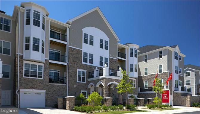 55+ condominium community with elevator & 1-car detached garage. Stunning new community surrounding the lake. Clubhouse with fitness center and outdoor pool for the condos only. Hardwood flooring in foyer, kitchen, dining and living rooms. Upgraded bathroom ceramic. Photos representative only