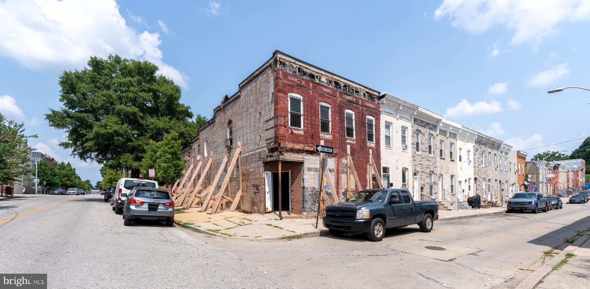 *INVESTOR ALERT* Zoned for 6 dwelling units, this gutted and framed two-story End-of-Group offers numerous finishing options with significant upside equity for development in the Station North Arts District! The existing structure allows for 4 dwelling units: two 1 Bed / 1 Bath units on the first floor, two 2 Bed / 1 Bath units on the second floor. Two additional 2 Bed / 1 Bath units possible with 3rd floor 27x65 addition. Original zoning plan allowed for a mix of two ground floor commercial units boasting 92’ of road frontage and four upper-level dwelling units with a total proposed enclosed space of 4600+ SQFT. Potential gross rental income as a 6-unit of $140,000. Ready for MEPs with an estimated 4-5 month timeline to completion as a 4-unit and 7-8 months as a 6-unit. Building permit, stamped drawings, site plans, residential change, and appraisal with a $1,240,000 completed valuation available upon request