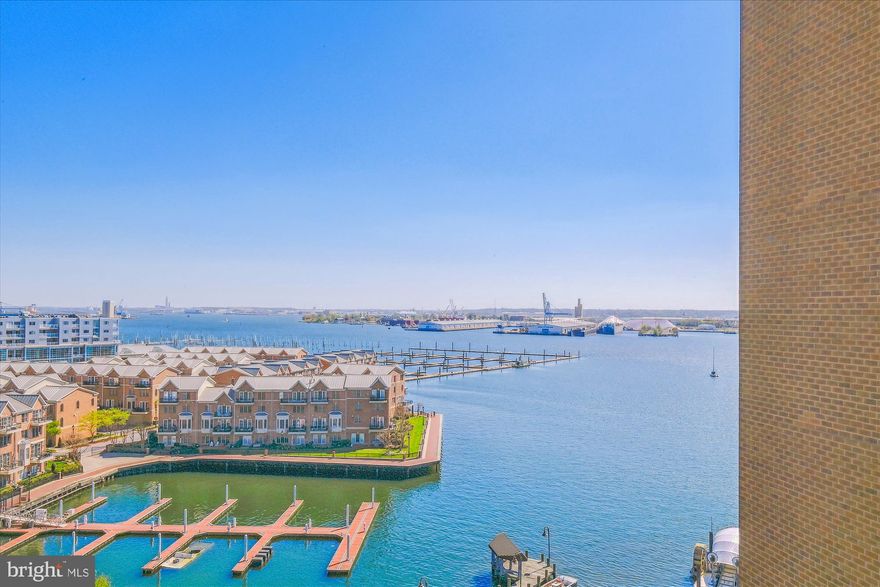 Welcome to 2515 Boston St. #1007. This 2 BR/2BA Luxury Waterfront Condo offers gorgeous panoramic water views from the moment you enter this desirable quiet, tucked away corner unit on the 10th floor. Updated Kitchen w/Granite counters and Breakfast Bar w/seating. High-end Stainless Steel appliances. Tons of  Custom Cabinetry. Dining Room off Kitchen w/access to the spacious 16'x8' Balcony overlooking majestic  water views and beyond. Pecan Hardwood Floors throughout. Freshly Painted. Family Room off Kitchen w/additional access to Balcony and stunning views. Primary Bedroom w/more spectacular water views. Primary Luxe Custom Spa Bath. Flexible 2nd Bedroom/Office or Den. Updated Full Bath. Newer HVAC(2022) and Water Heater(2021). Large Storage Unit adjacent to unit. 2-Assigned Parking Spaces.  Condo is wired w/Cat 7 Ethernet.  The Anchorage is a pet friendly building. Condo fees include sewer and water, 24/7 Concierge, Security and so much more. Gated garage. Plenty of Guests Spaces. Great location. Steps from restaurants, shopping, and the Waterfront Promenade. Feel like you are on vacation all year long! Close to all major highways. Easy to show.