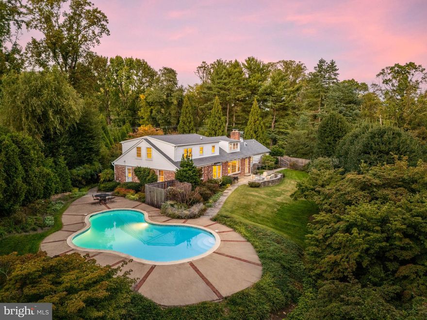 Charming brick Cape Cod perched on an enchanting lot along beloved Cricket Lane in the Radnor Township section of Wayne. Offered for the first time in over 60 years, this home reflects unparalleled pride of ownership and timeless appeal. The classic curb presence is complemented by an utterly private setting featuring a beautiful flagstone terrace, glistening pool, and mature gardens that have been thoughtfully landscaped for decades. Step inside the center hall entrance to find sun-filled spaces rich in character and detail. The gracious living room is a true showpiece, featuring a wood-burning fireplace flanked by custom built-ins and an oversized window overlooking the terrace, accessed through a charming Dutch door. A spacious dining room easily accommodates family gatherings, while the bright, white kitchen also opens to the backyard. A cozy study with additional built-ins offers an inviting spot for reading or relaxation, a perfect family room. The sought-after first-floor primary suite includes a walk-in closet and a large bathroom with a deep soaking tub set beneath a picture window. An additional first-floor bedroom makes an ideal home office or can be incorporated into an expanded primary suite. This room also has a Dutch door to the pool, adding to the seamless indoor/outdoor flow. Beautiful hardwood floors run throughout the first floor. Upstairs, three generous bedrooms share a hall bath and offer abundant closet space. The partially finished lower level provides versatile space for a game room, media room, or home gym. Outside, well-designed landscape lighting creates an elegant evening glow across the property. Highlights include a new roof accented with copper awnings, copper plumbing, new siding, new furnace, new hot water heater, a generator, and a recently re-plastered pool with all new equipment. A spacious driveway with ample parking and an attached garage make it easy to host. Tucked within a quiet, sought-after neighborhood yet minutes from shops, schools, and major roadways, this home embodies the best of Radnor Township living—a rare opportunity to own a truly special property in one of the Main Line’s most cherished locations.